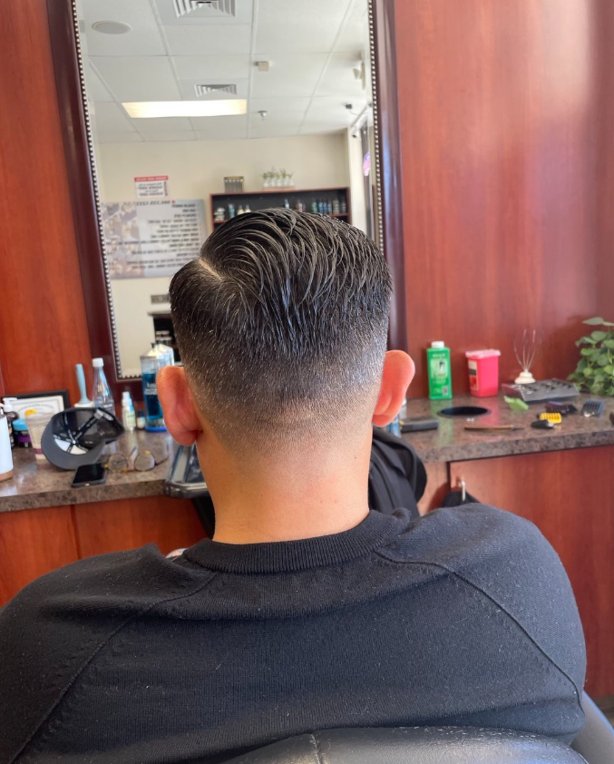 man in barbers chair